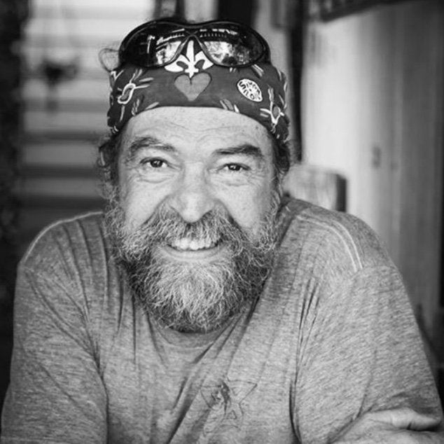 Portrait of Simon Hardeveld, known as Simon of New Orleans, the acclaimed folk artist whose colorful signs and artwork celebrate the spirit and culture of New Orleans.