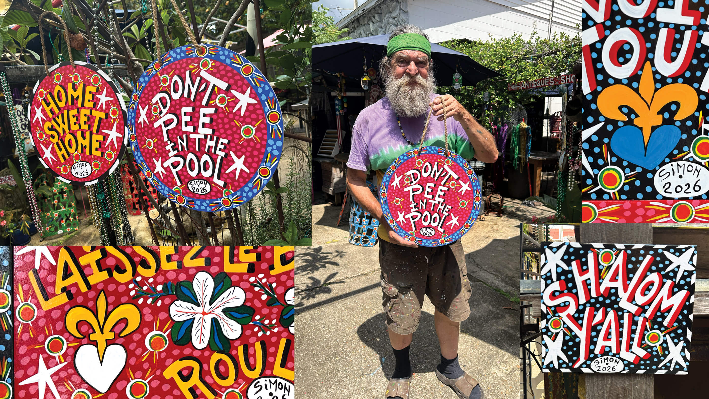 Simon of New Orleans holding colorful, printed door hangers featuring his original New Orleans folk art style.