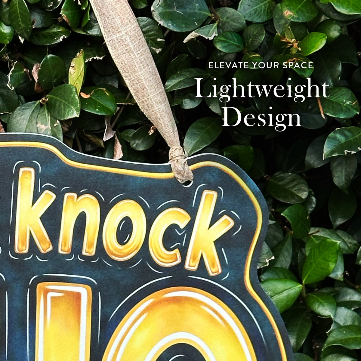 A decorative hanging sign with the word 'knock knock WHO DAT' in large yellow lettering, suspended by a beige ribbon against a background of green leaves. White text on the image reads 'ELEVATE YOUR SPACE Lightweight Design'.